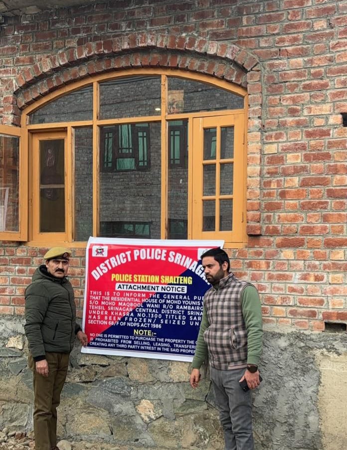 Srinagar Police attaches property worth lakhs of rupees under the NDPS Act, belonging to an infamous drug peddler